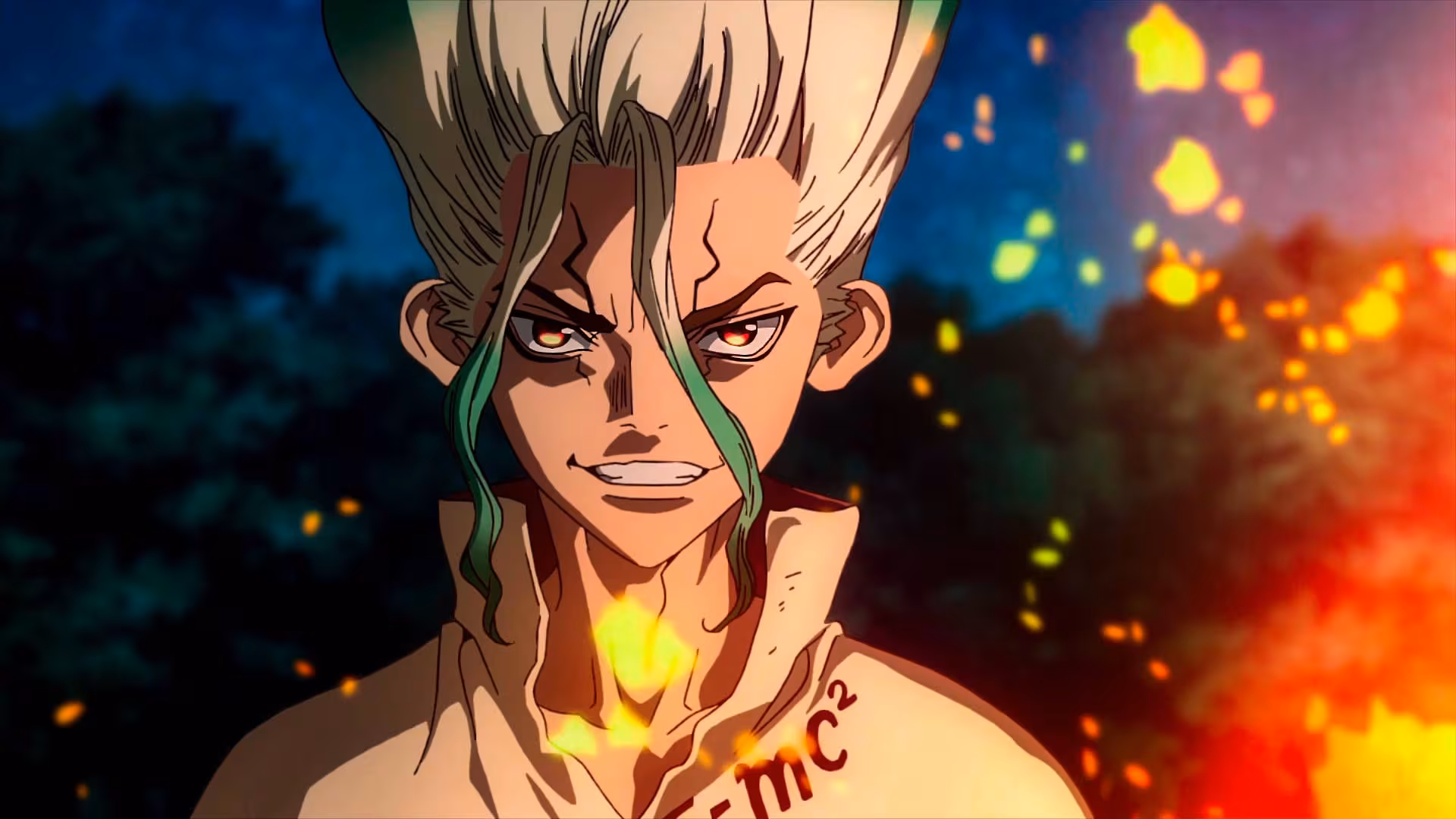 Senku from Dr. Stone grins with fierce determination, his face lit by fire and sparks against a dark forest at night. He has spiky, light-colored hair with green tips, cracks on his face, and "E=mc²" written on his collar.